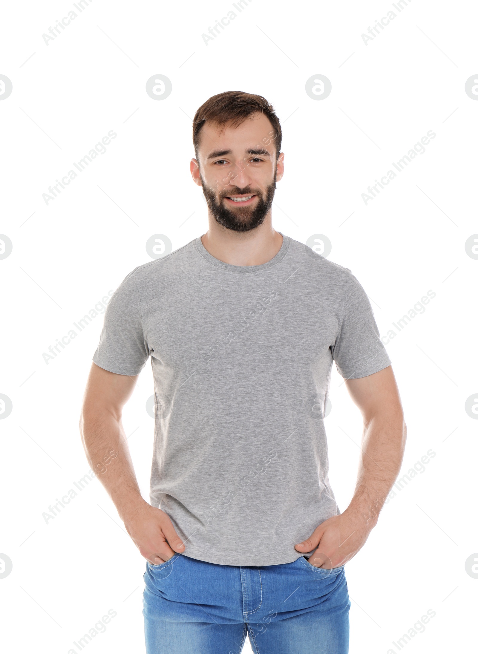Photo of Young man in t-shirt on white background. Mockup for design