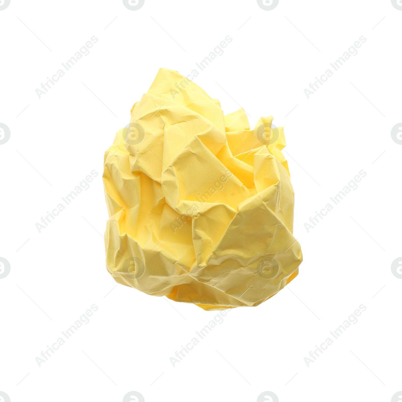 Photo of Crumpled sheet of yellow paper isolated on white, top view