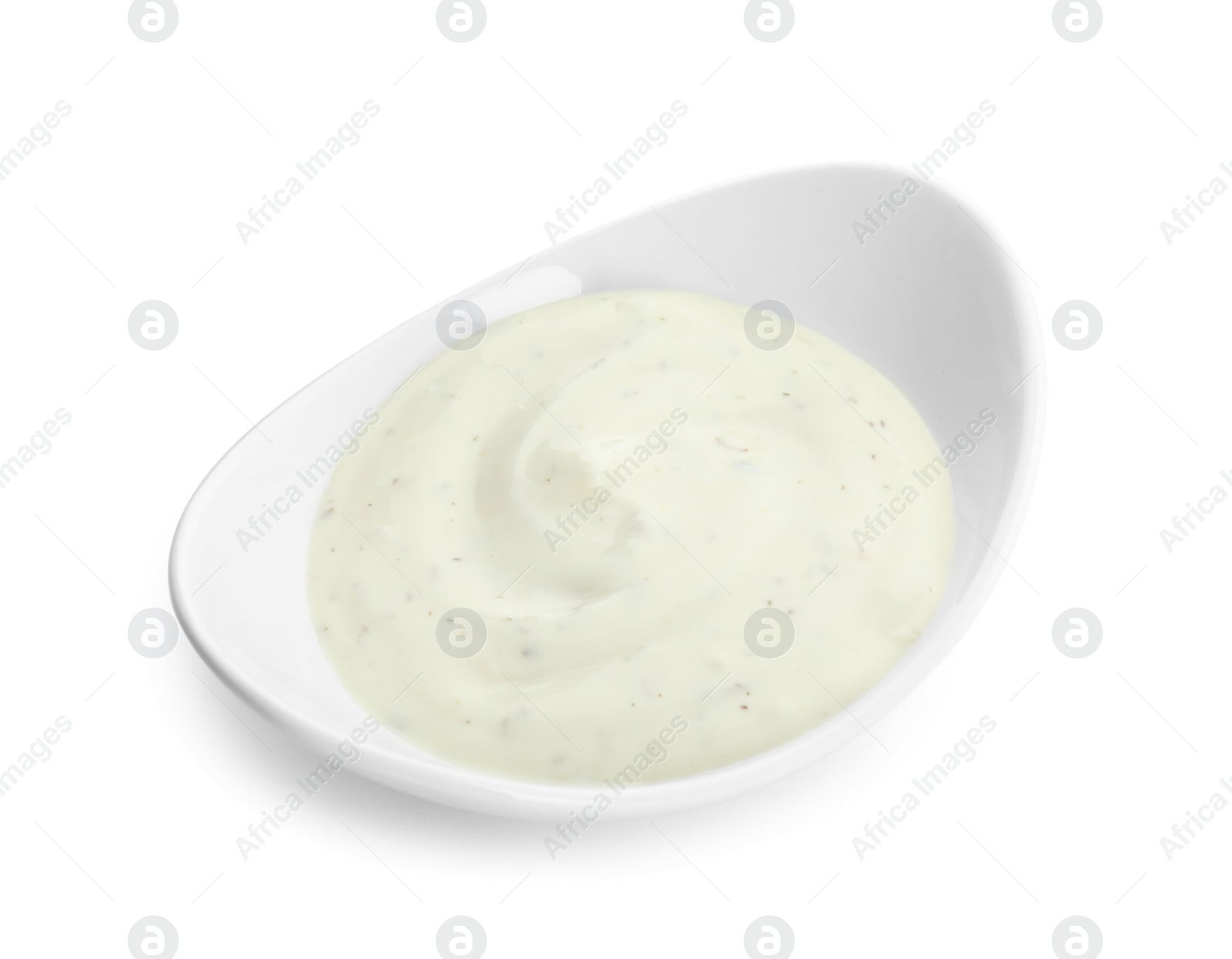 Photo of Bowl of homemade garlic sauce isolated on white