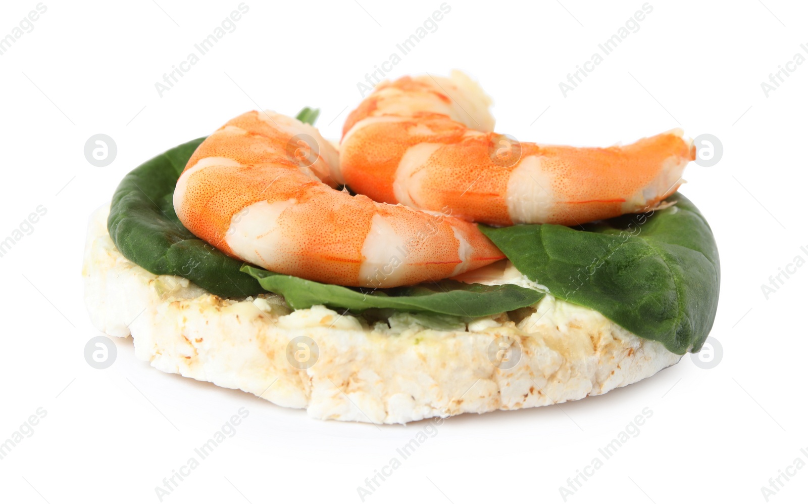 Photo of Puffed rice cake with shrimps and basil isolated on white