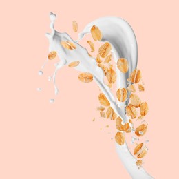 Image of Rolled oats and milk splash on pink background