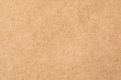 Texture of kraft paper sheet as background, closeup