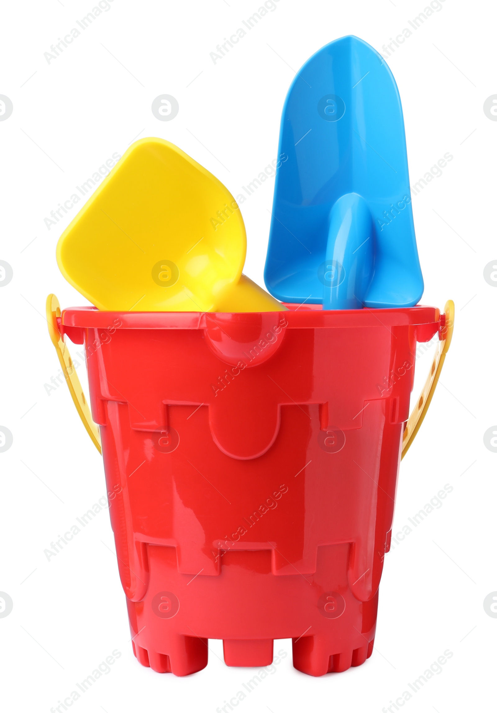 Photo of Plastic toy bucket with colorful shovels on white background
