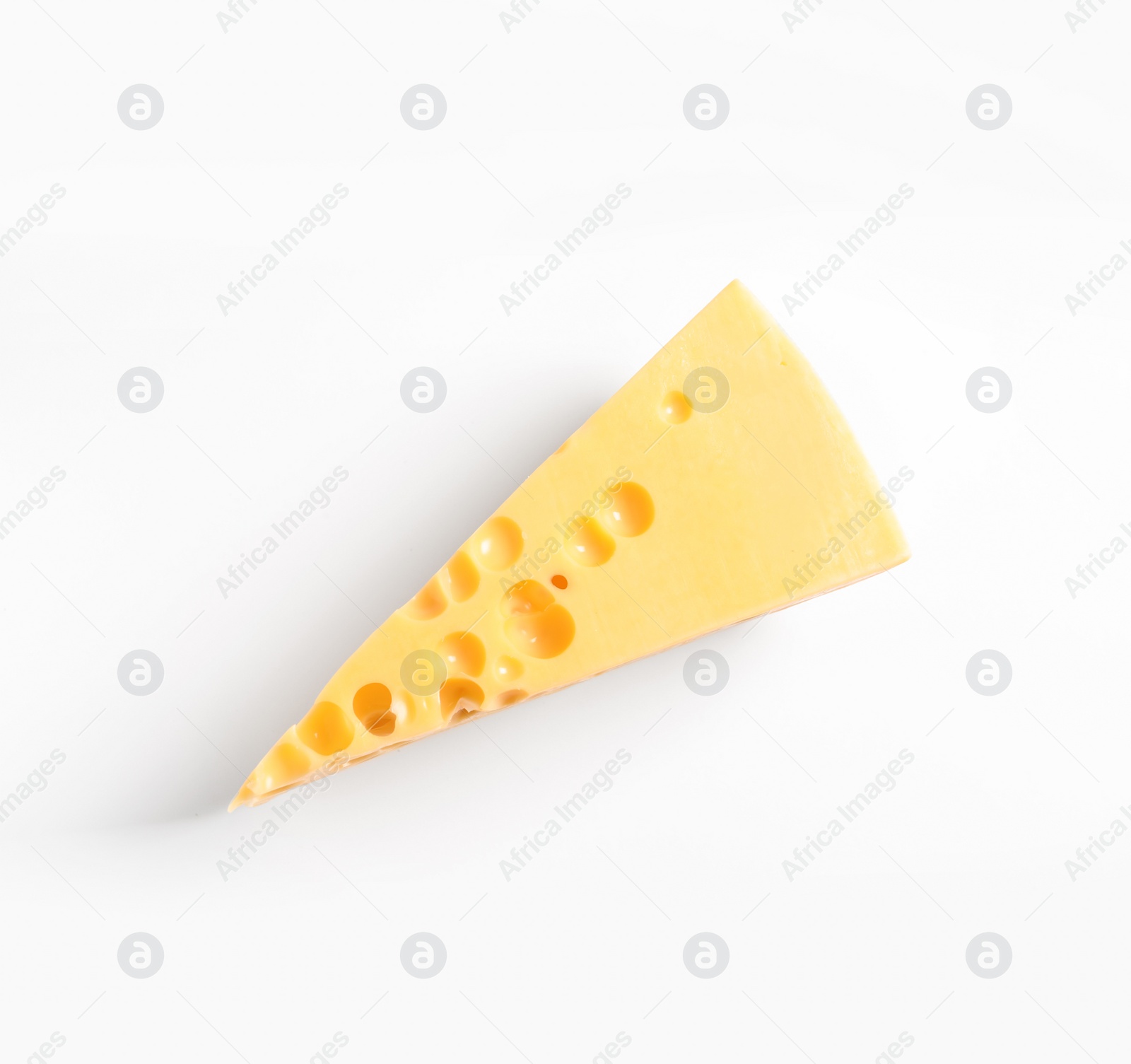 Photo of Piece of cheese on white background, top view. Natural food high in protein