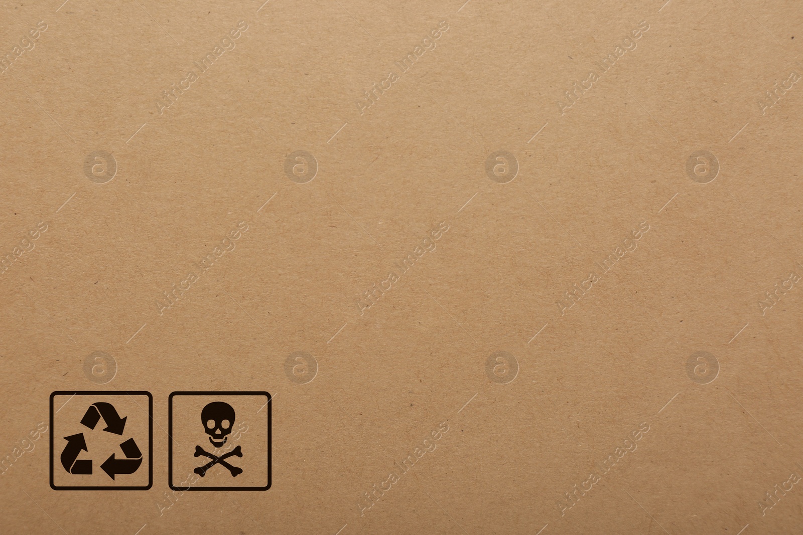 Image of Cardboard box with packaging symbols as background, closeup