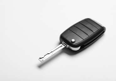 New modern car key on white background