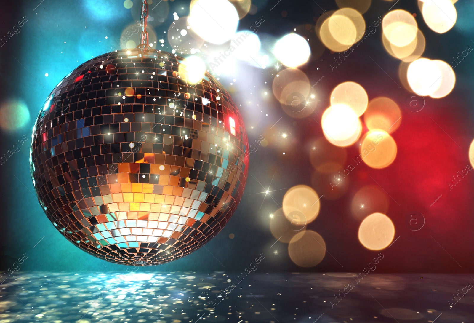 Image of Shiny disco ball under golden lights on color background, space for text. Bokeh effect