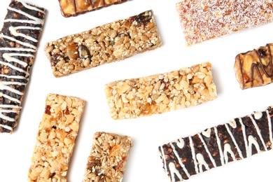 Photo of Different grain cereal bars on white background. Healthy snack