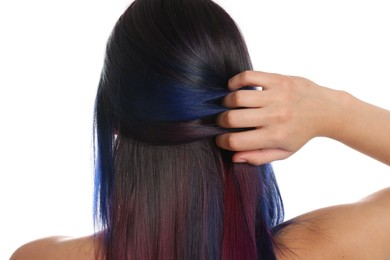 Young woman with bright dyed hair on white background, back view. Closeup