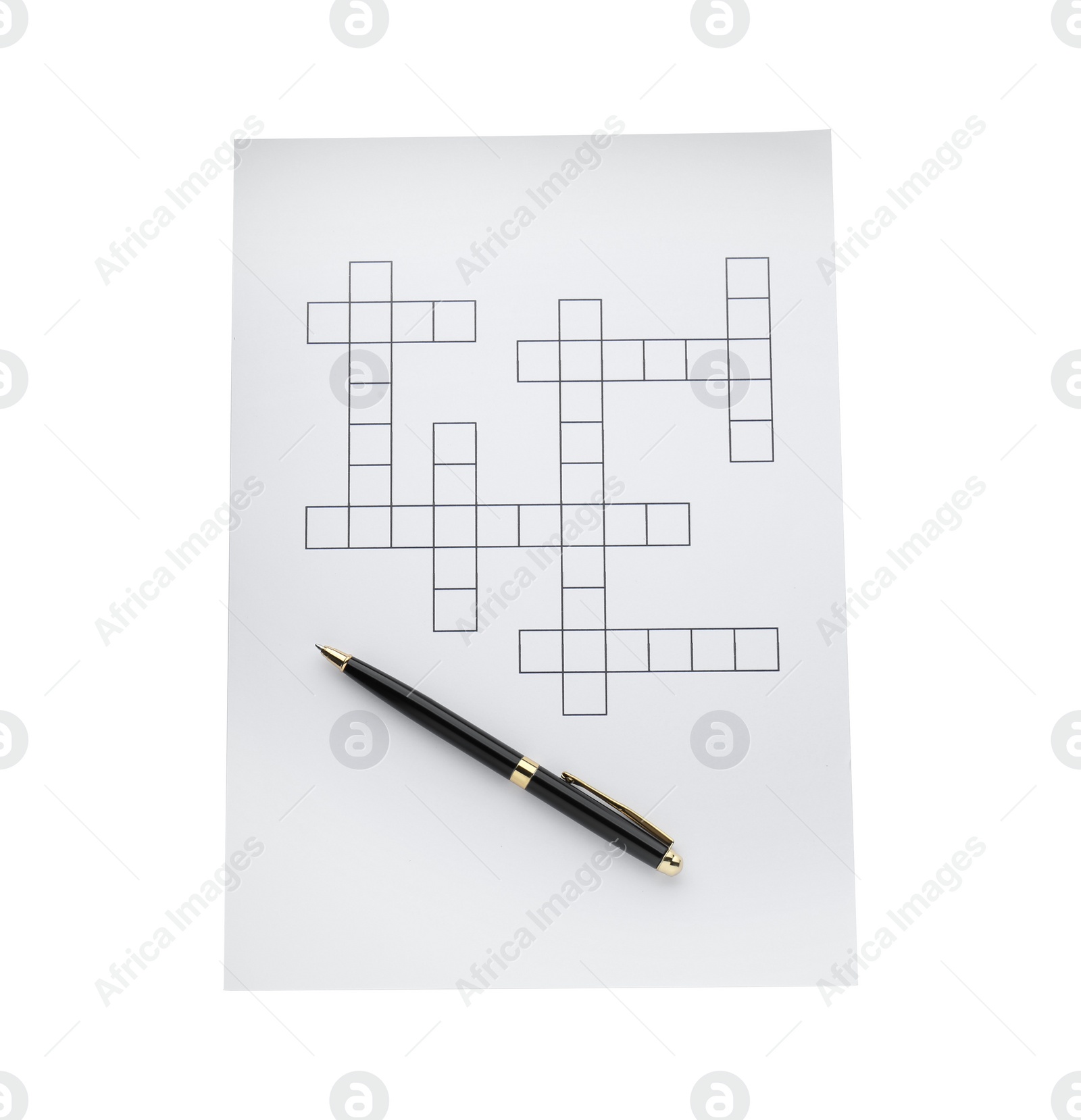 Photo of Blank crossword and pen on white background, top view