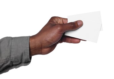 Photo of African American man holding paper cards on white background, closeup. Mockup for design