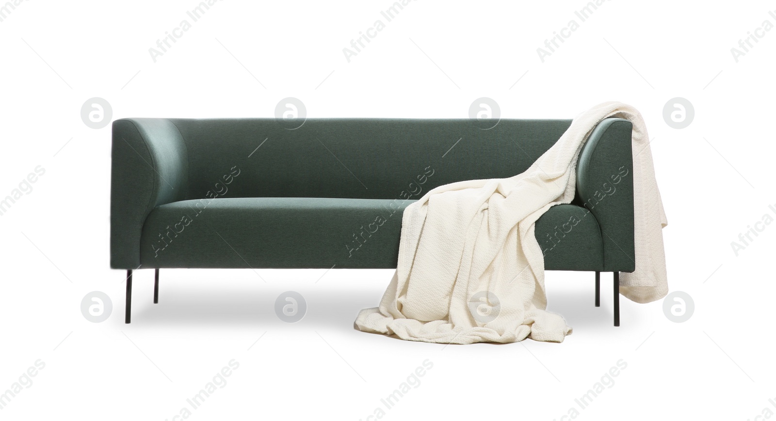 Photo of Comfortable green sofa with blanket on white background. Furniture for living room interior