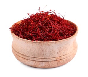 Photo of Dried saffron in wooden bowl isolated on white