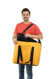 Young courier with thermo bag on white background. Food delivery service