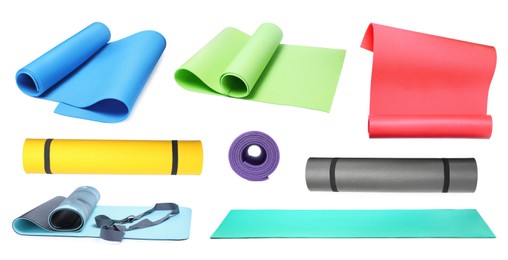 Image of Set with colorful camping mats on white background 