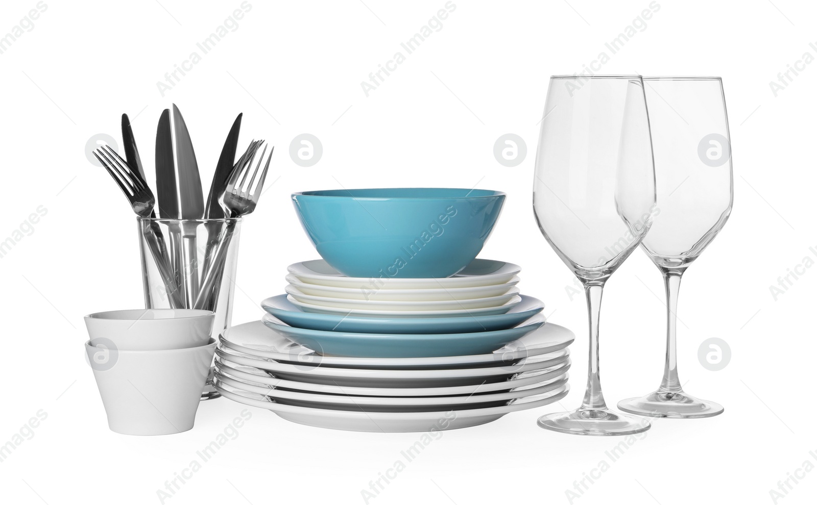 Photo of Set of beautiful ceramic dishware, glasses and cutlery isolated on white