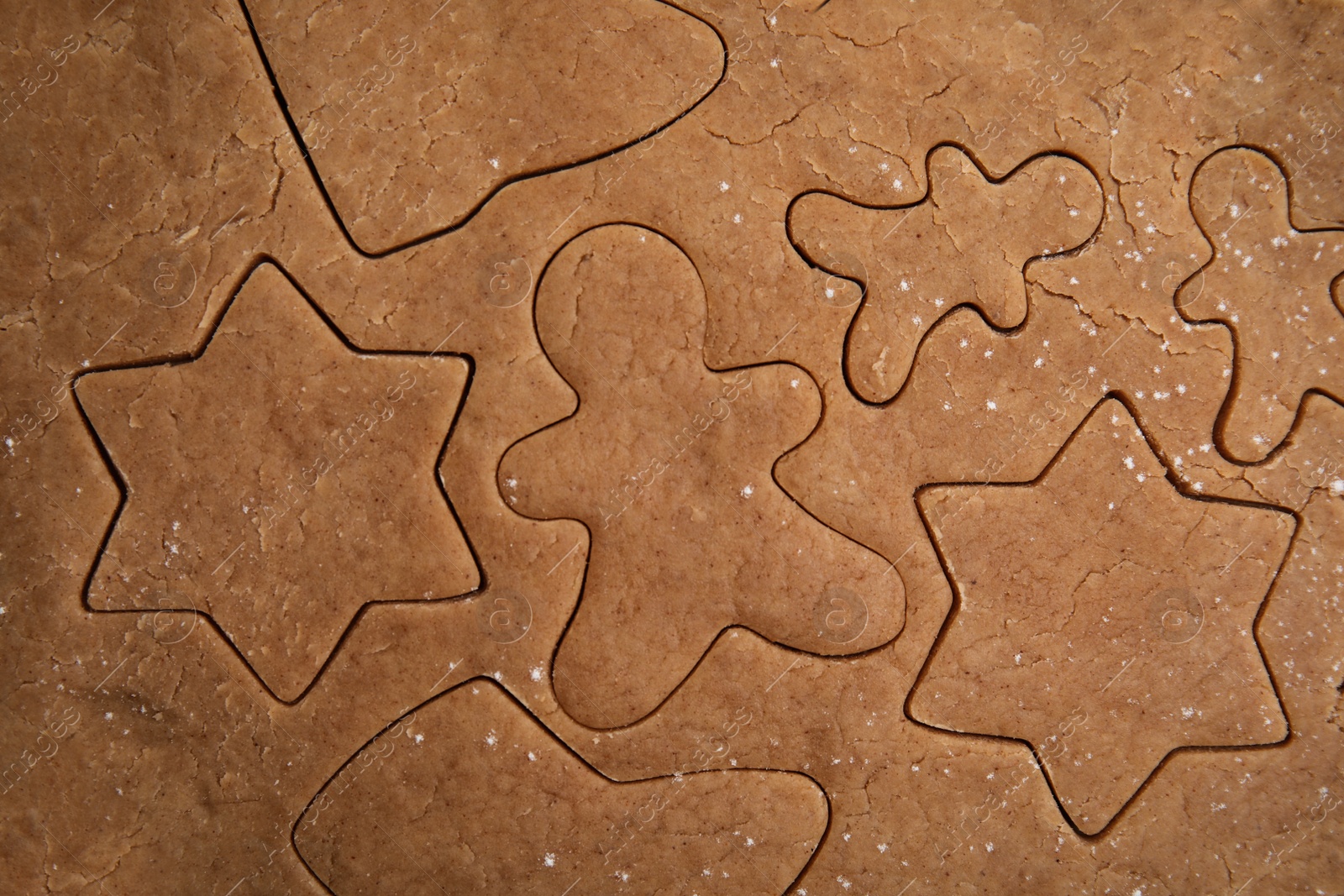 Photo of Making Christmas cookies. Raw dough as background, top view