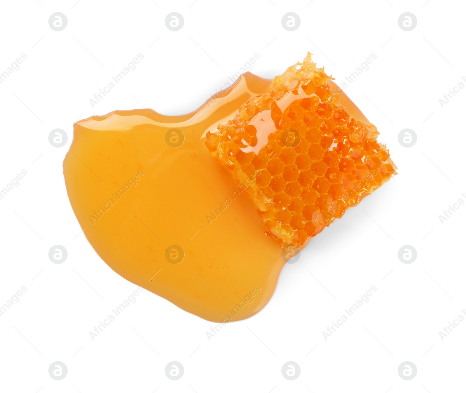 Photo of Natural honeycomb with tasty honey isolated on white, top view