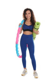 Photo of Beautiful African American woman with yoga mat and hula hoop on white background