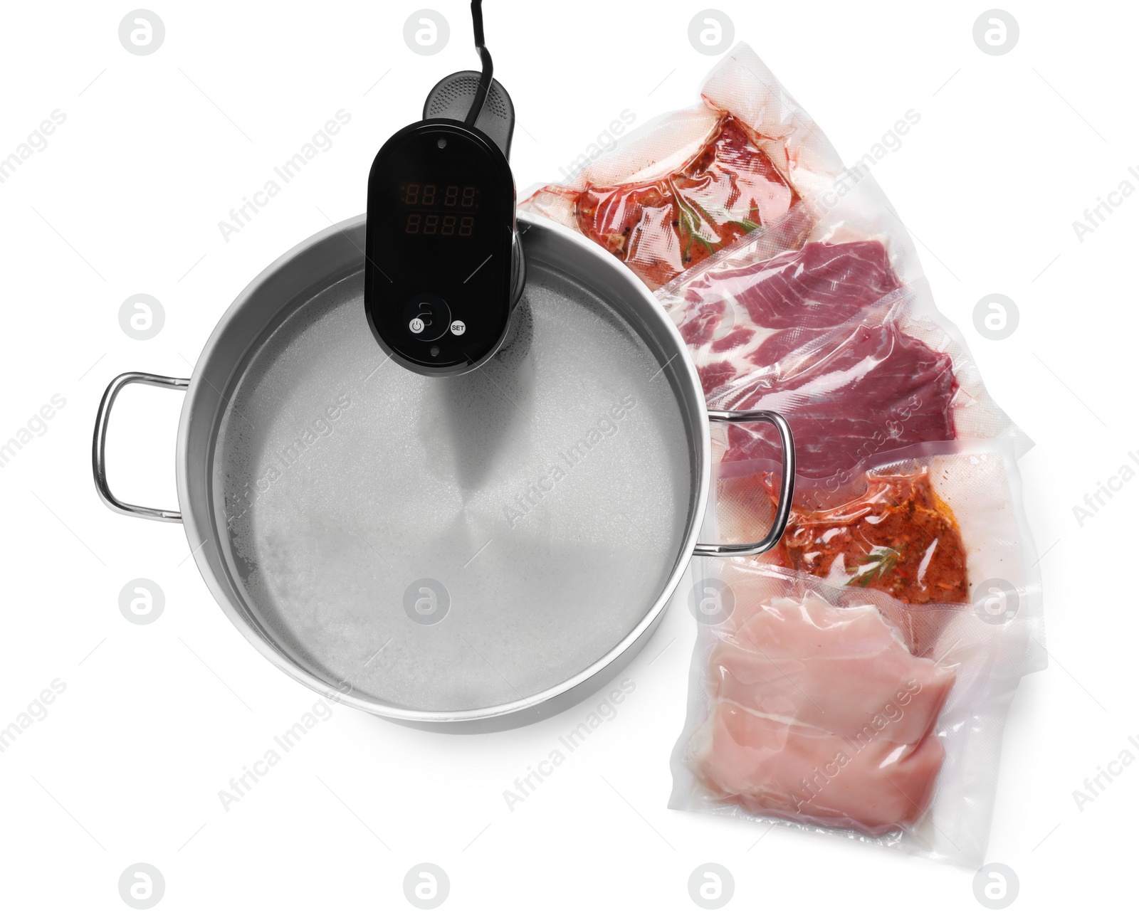 Photo of Thermal immersion circulator in pot and meat on white background, top view. Vacuum packing for sous vide cooking