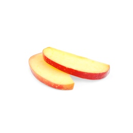 Photo of Slices of ripe juicy red apple on white background