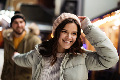 Lovely couple on city street. Winter vacation