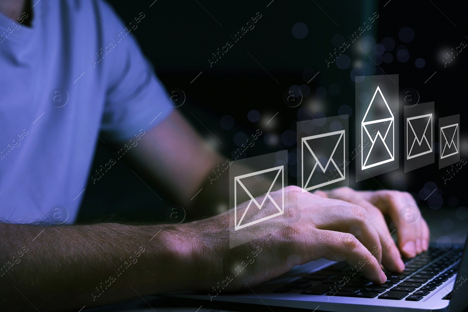Image of Email. Man using laptop at table, closeup. Letter illustrations over device