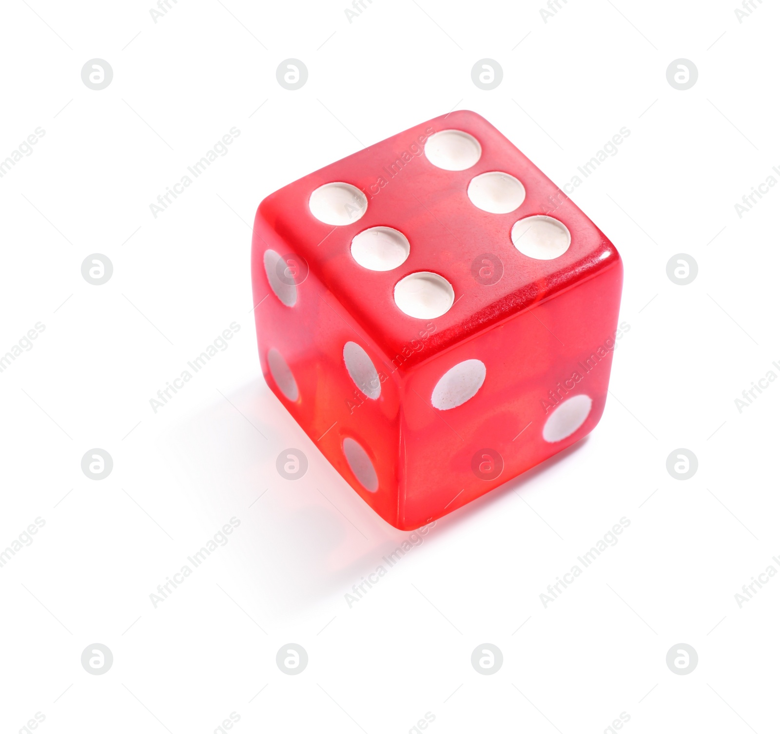 Photo of One red game dice isolated on white