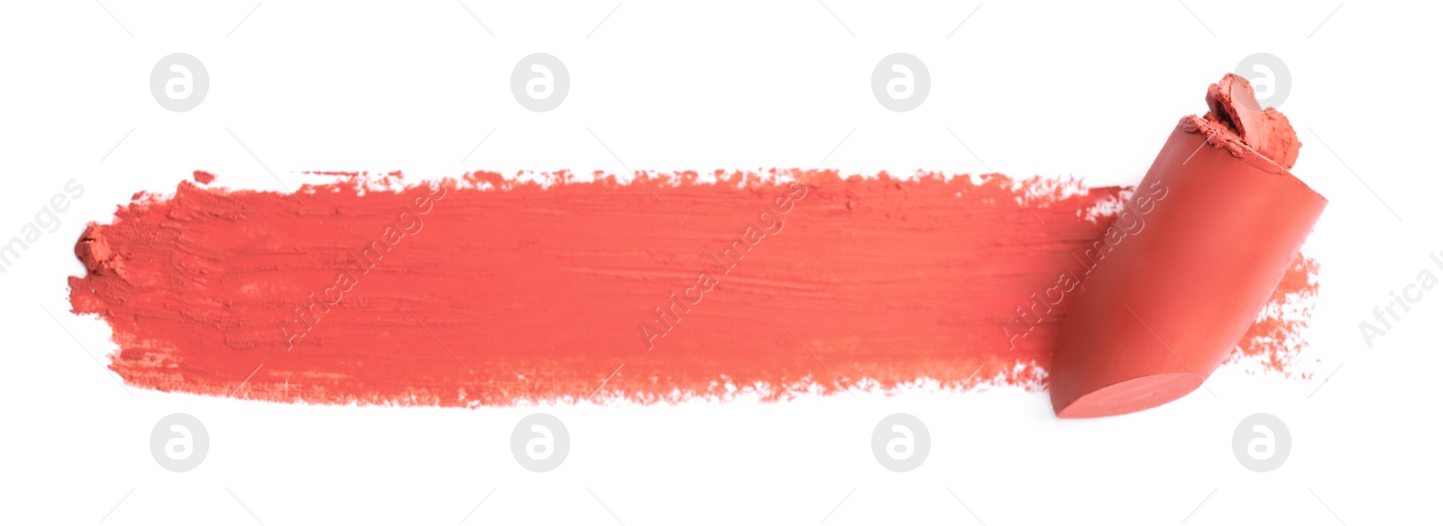 Photo of Lipstick and swatch on white background, top view