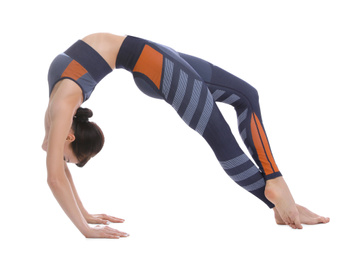 Photo of Professional young acrobat exercising on white background