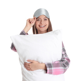 Photo of Young woman with pillow and sleep mask on white background