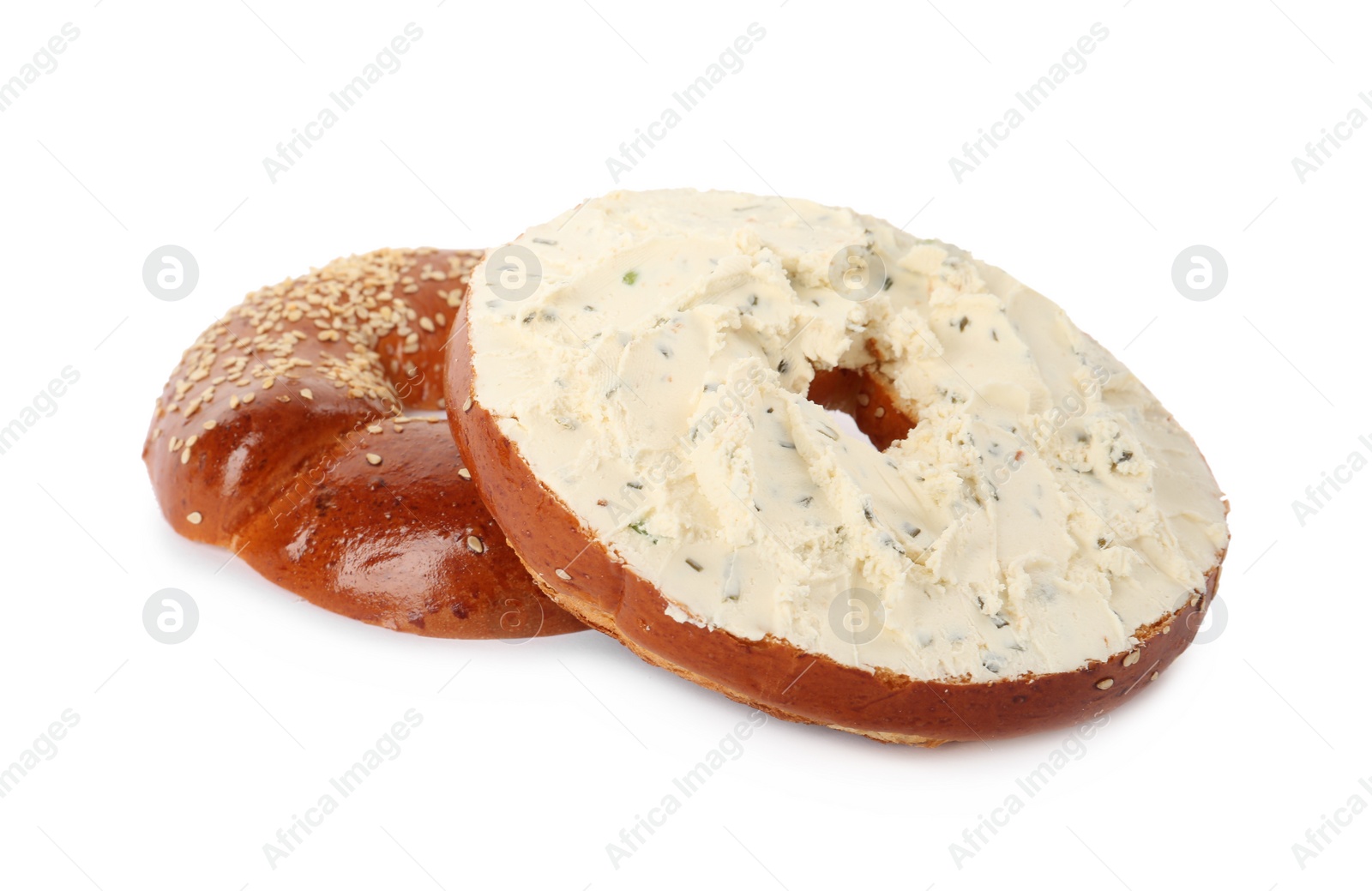 Photo of Delicious fresh bagel with cream cheese on white background