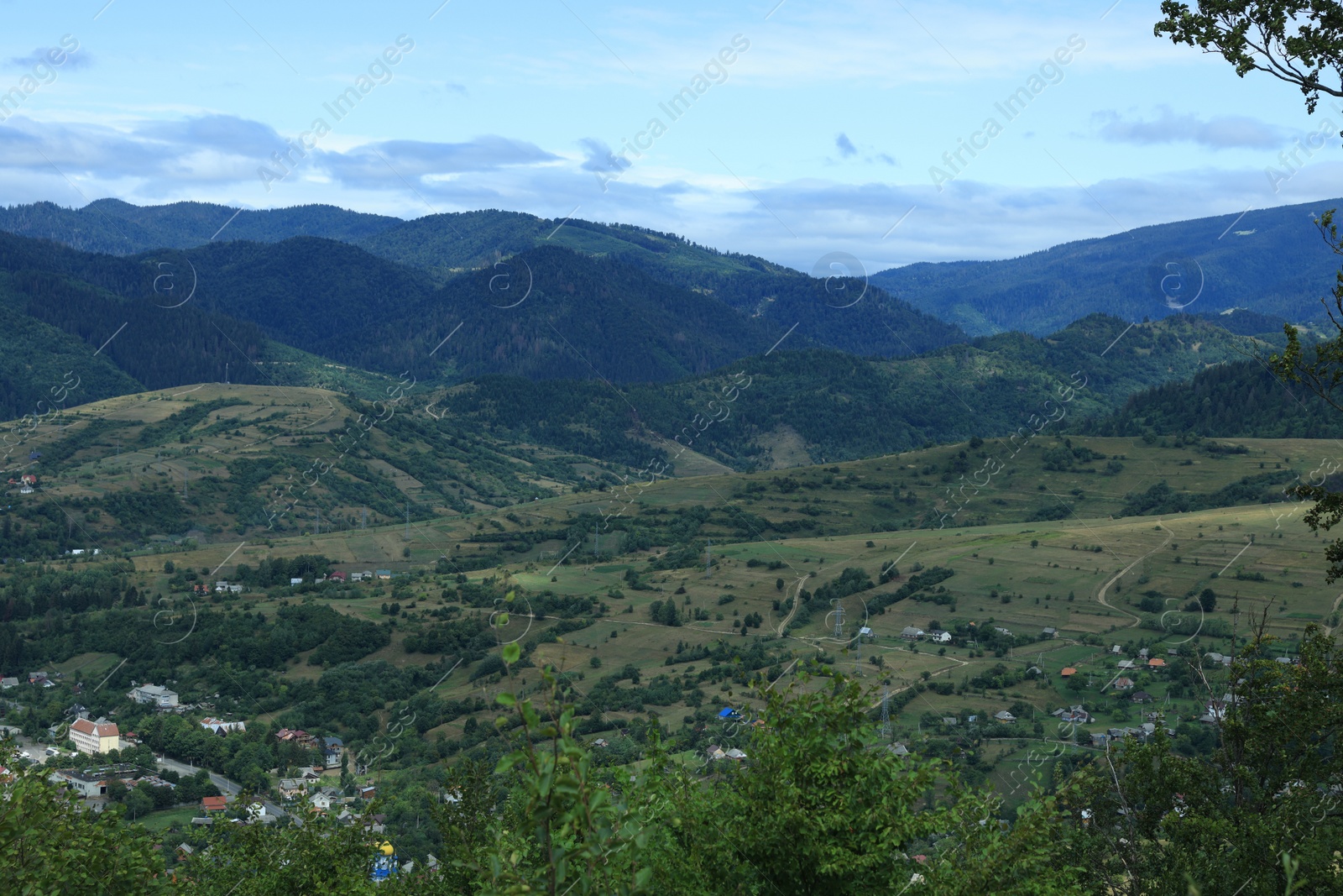 Photo of Picturesque view of beautiful mountains under cloudy sky