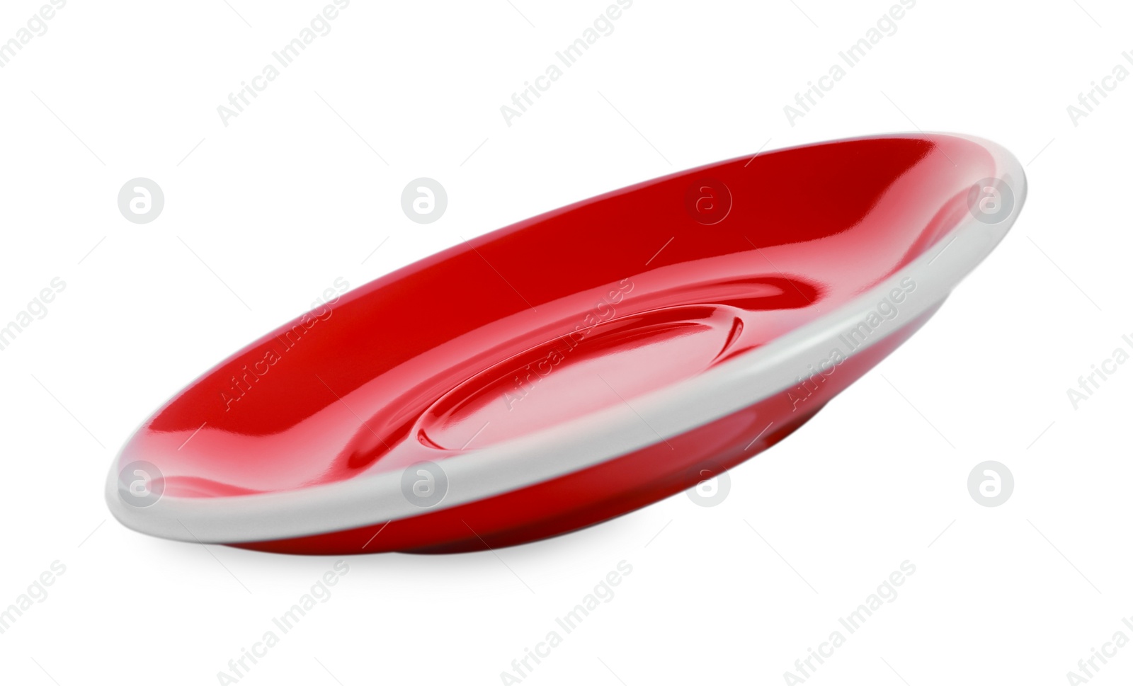 Photo of One red ceramic saucer isolated on white