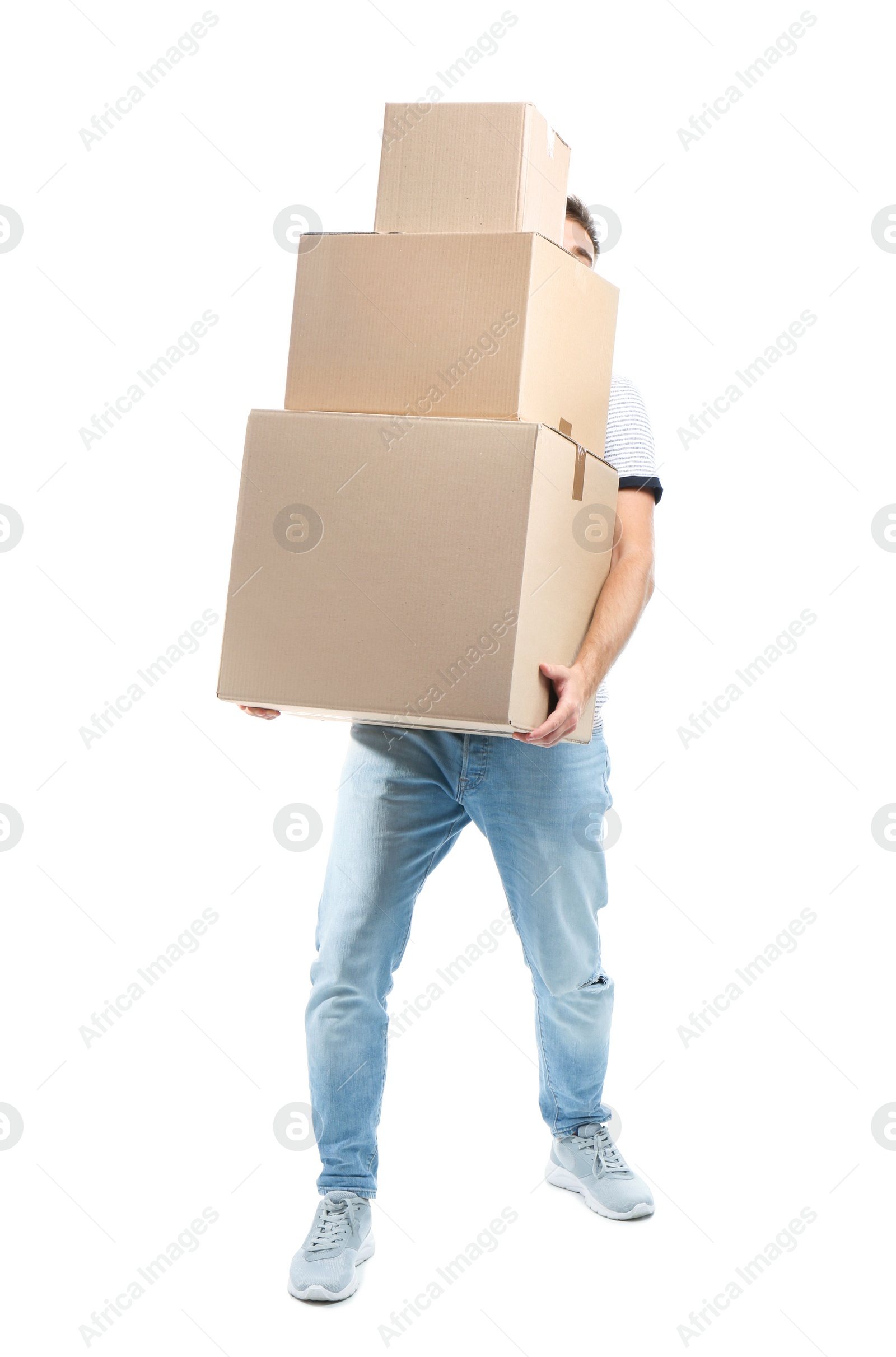 Photo of Young man carrying carton boxes on white background. Posture concept