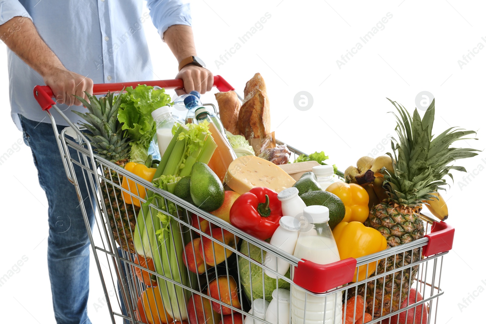 Photo of Man with shopping cart full of groceries on white background, closeup