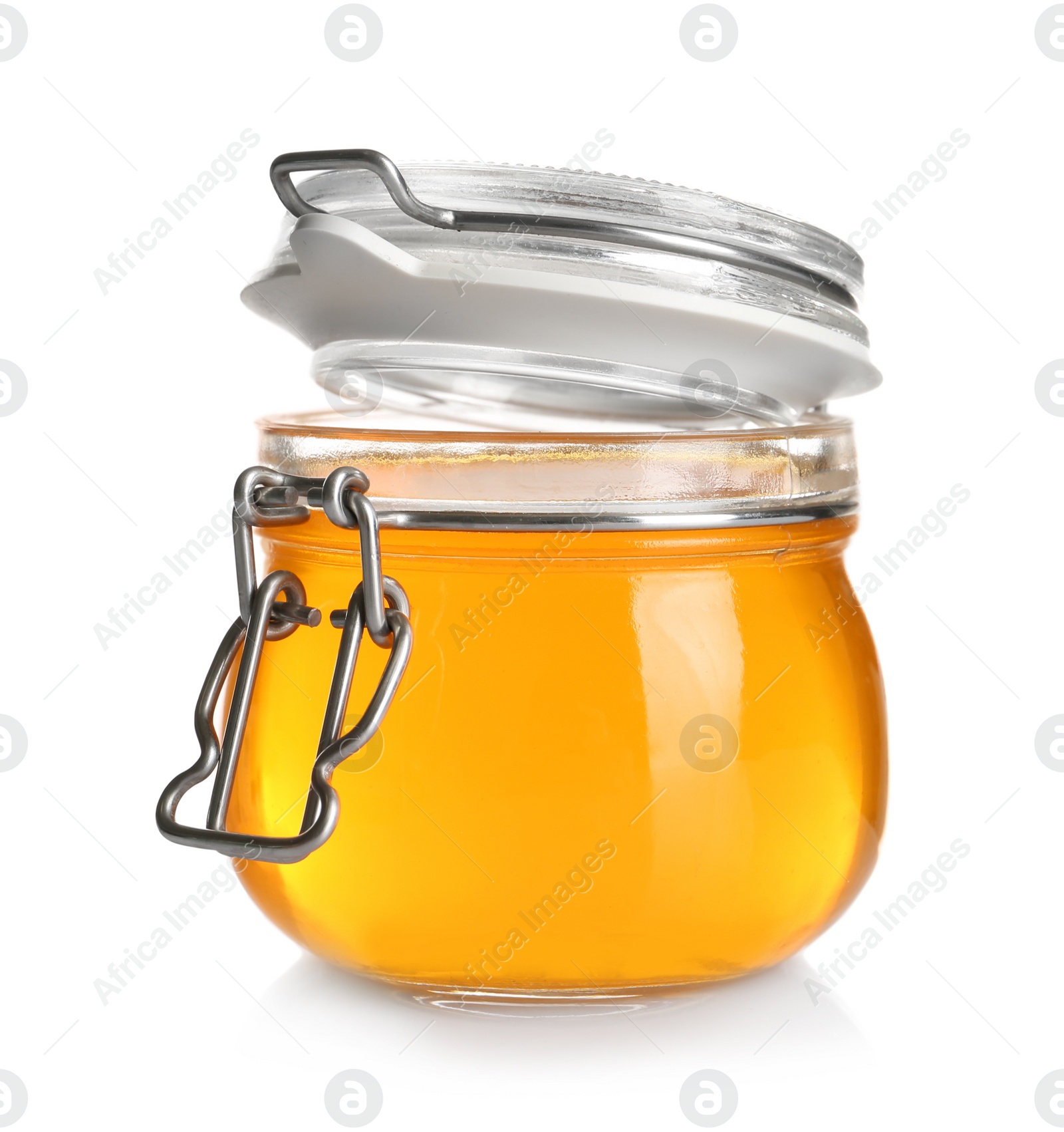 Photo of Jar with tasty jelly on white background