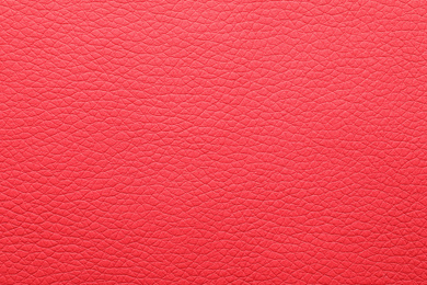 Texture of red leather as background, closeup