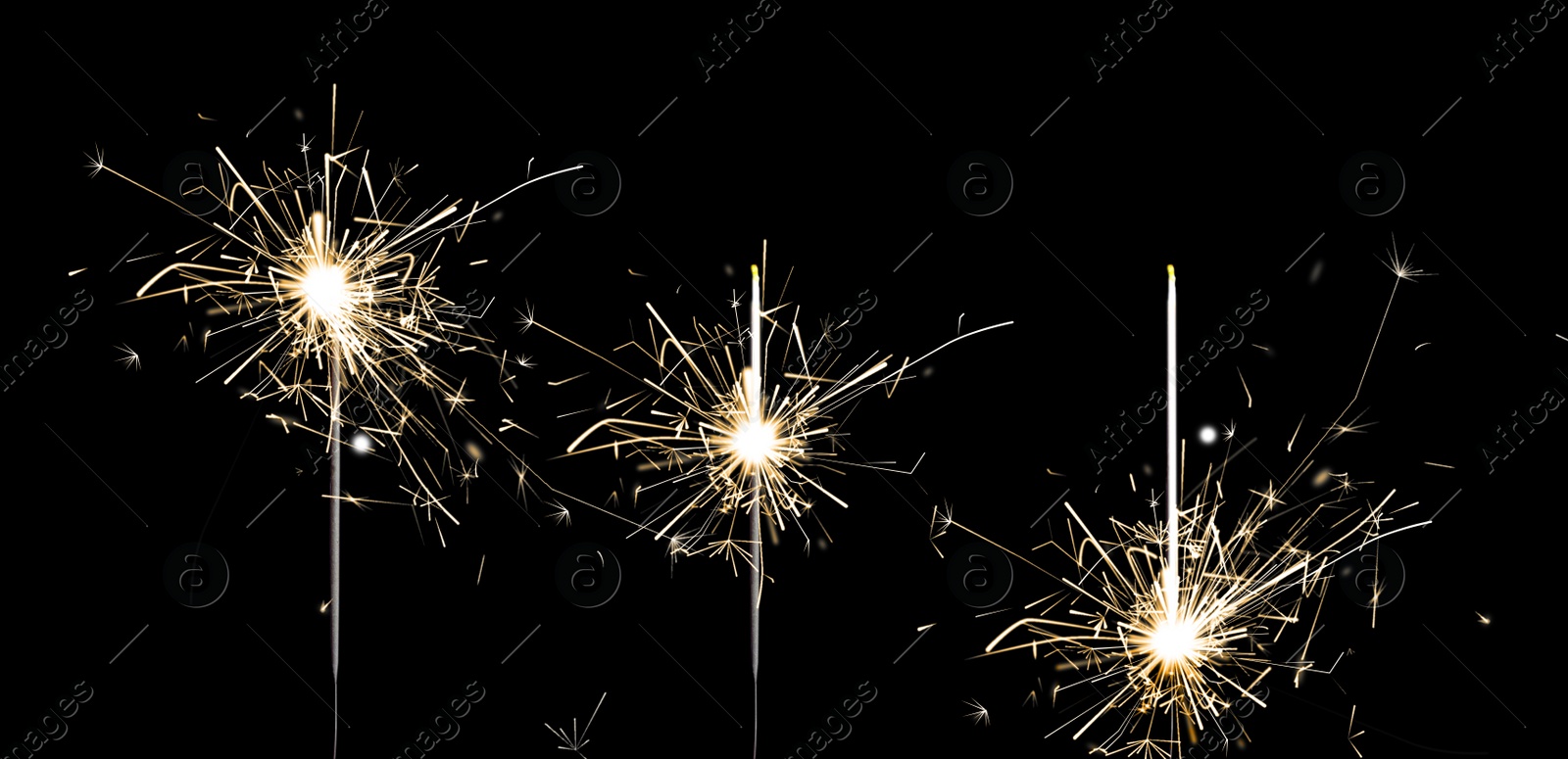 Image of Set of burning sparklers on black background. Banner design