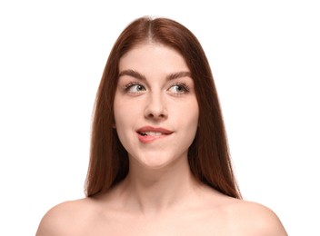 Portrait of beautiful woman with freckles on white background