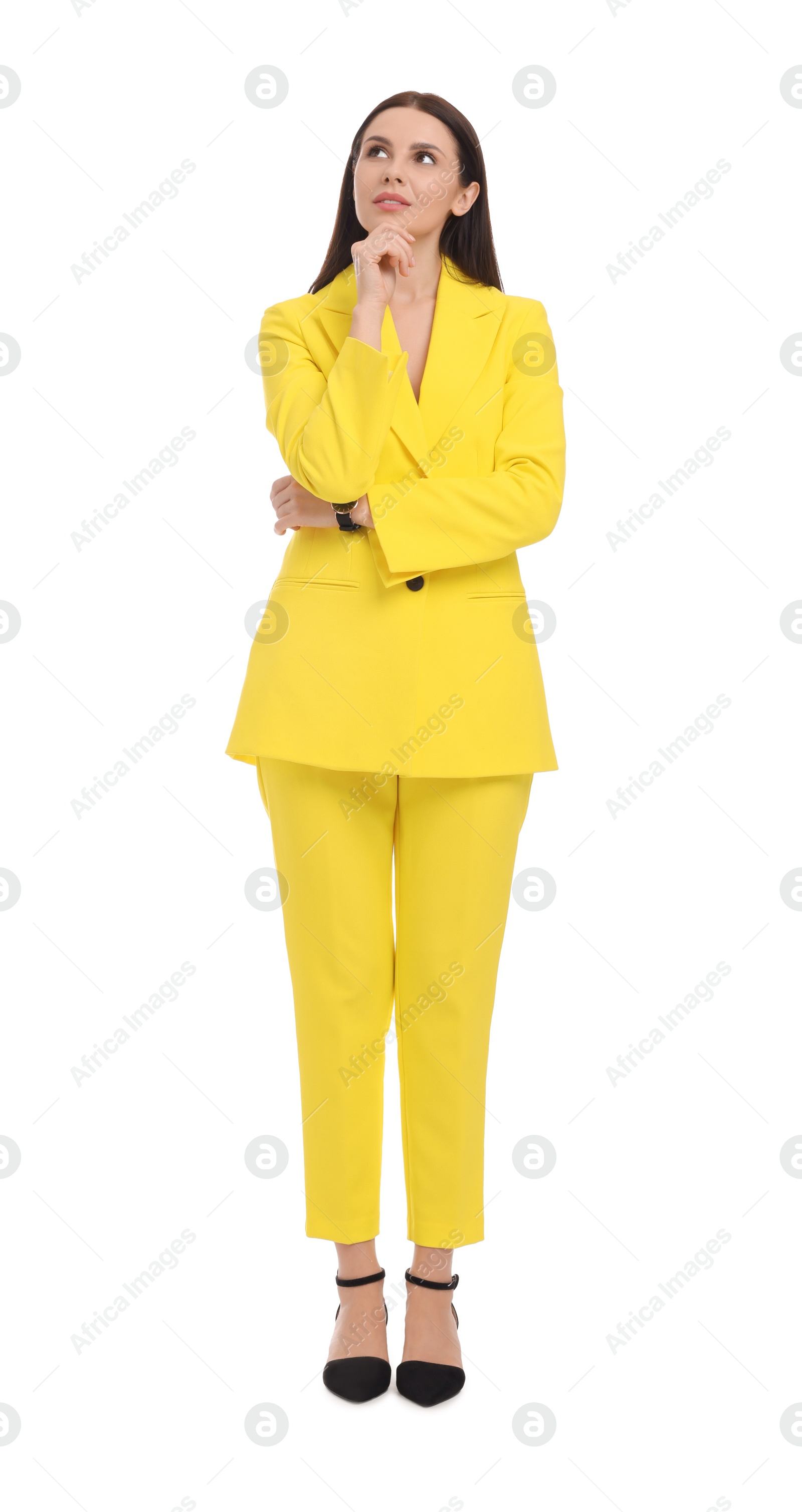 Photo of Beautiful businesswoman in yellow suit on white background