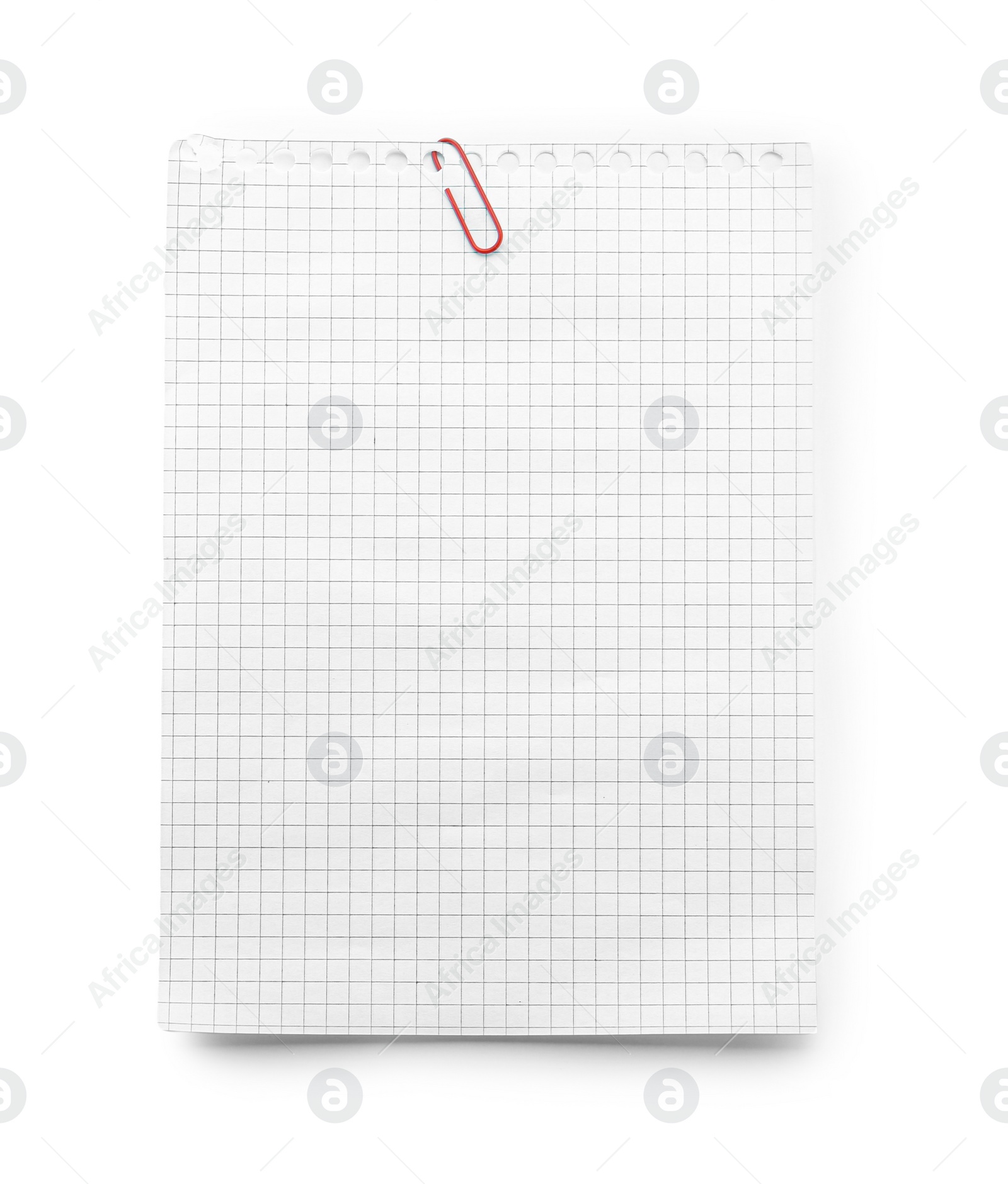 Photo of Checkered notebook paper with clip isolated on white, top view