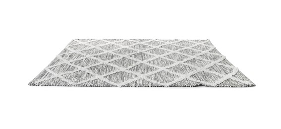 Photo of Stylish grey rug isolated on white. Interior accessory