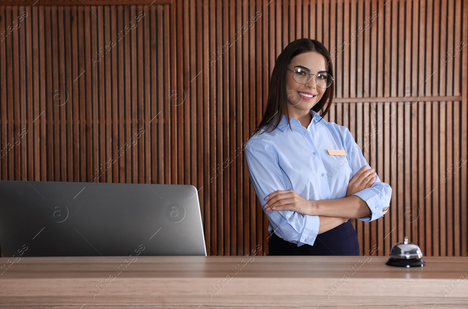 Photo of Portrait of receptionist at desk in lobby