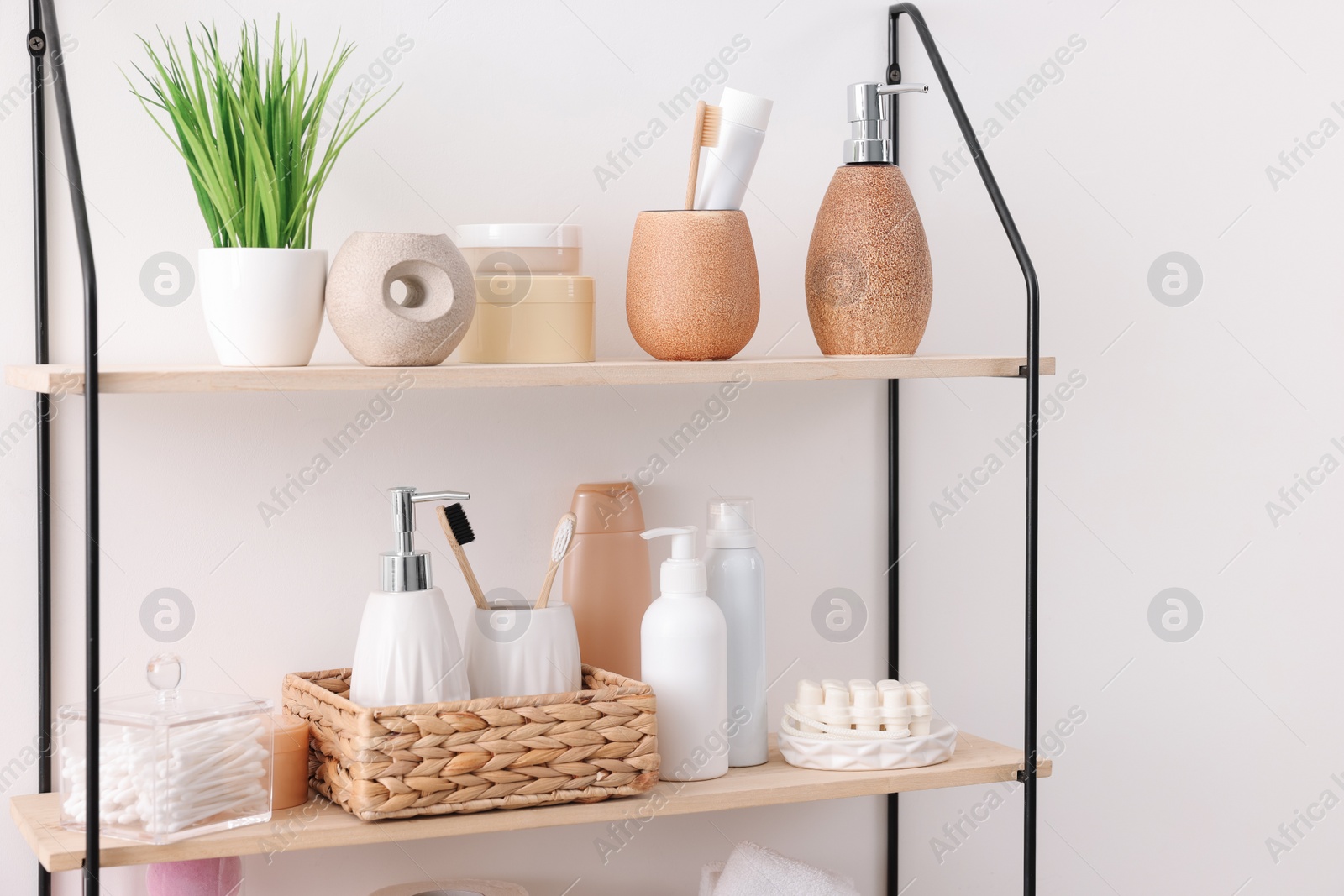 Photo of Different bath accessories, personal care products and artificial plant indoors, space for text