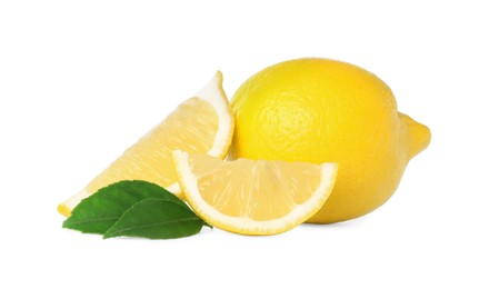Photo of Cut and whole ripe lemons with green leaves isolated on white