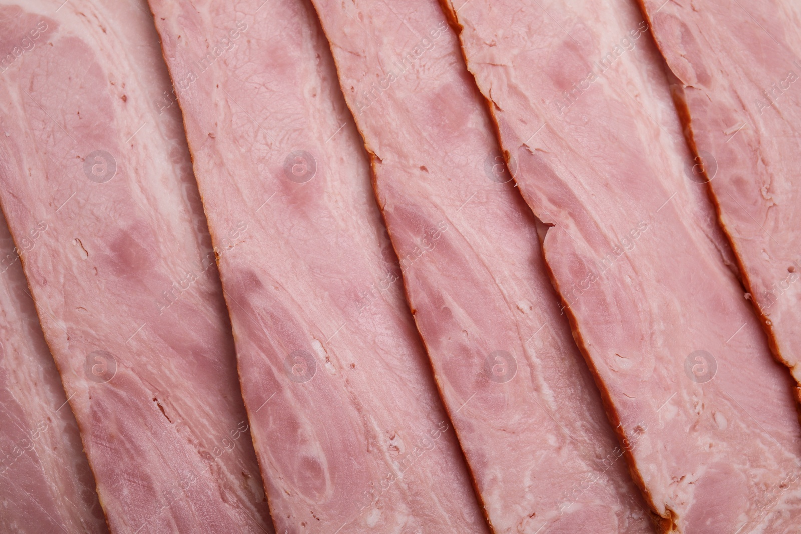 Photo of Slices of delicious smoked bacon as background, closeup