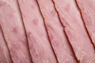 Photo of Slices of delicious smoked bacon as background, closeup