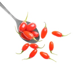 Photo of Fresh ripe goji berries and spoon on white background, top view