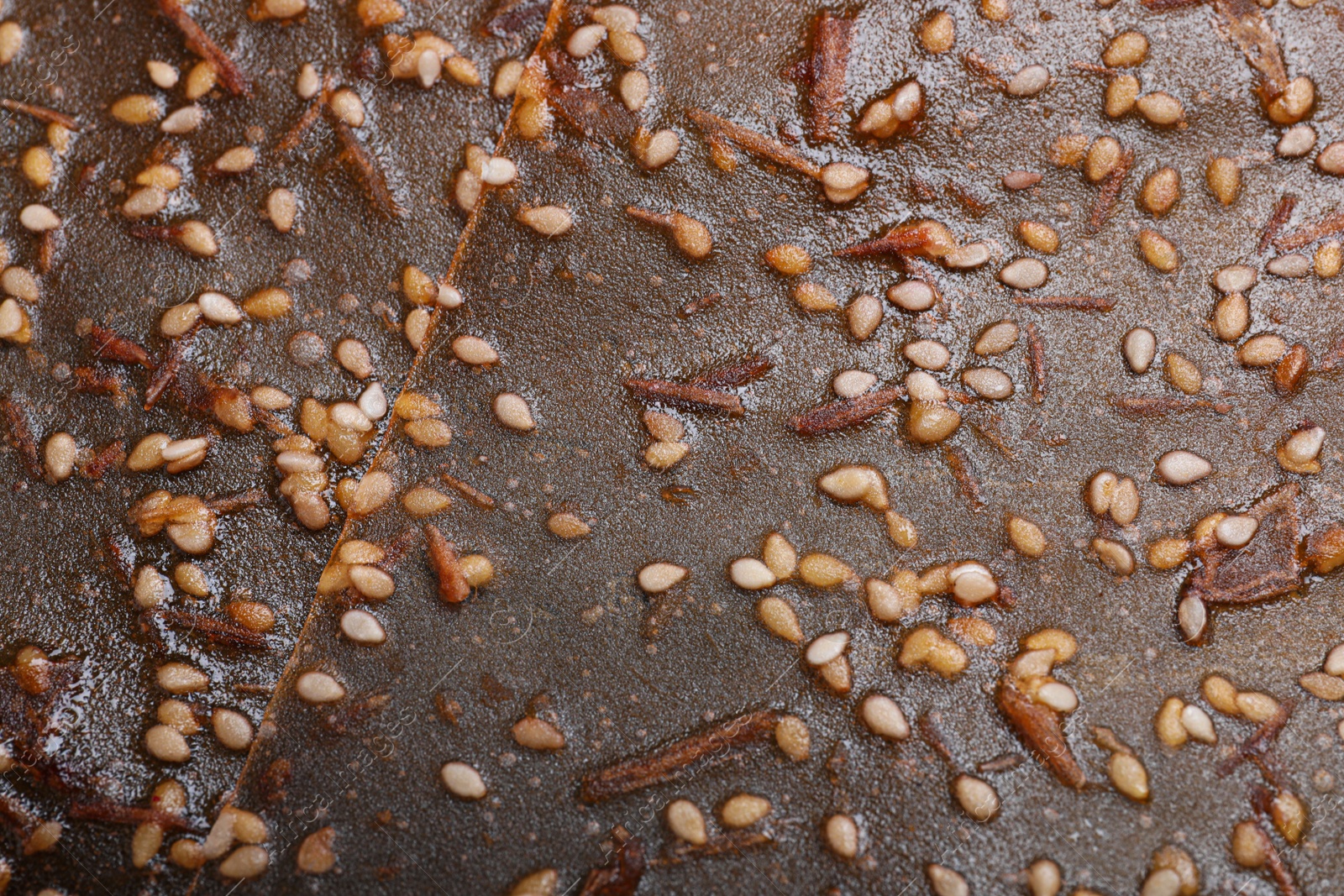 Photo of Delicious fruit leather as background, closeup view